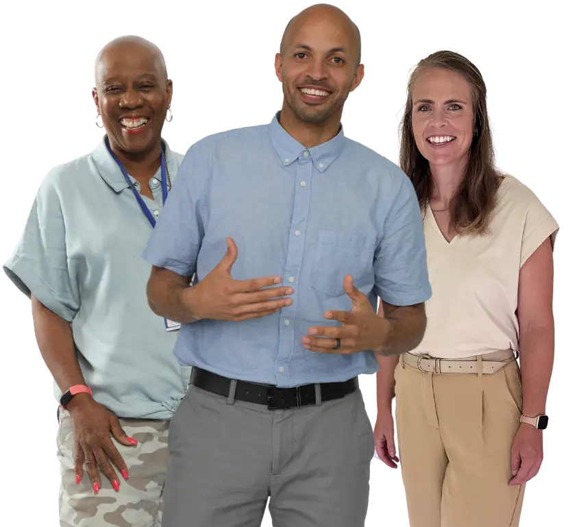 One male and two female teachers smiling and standing beside each other
  
