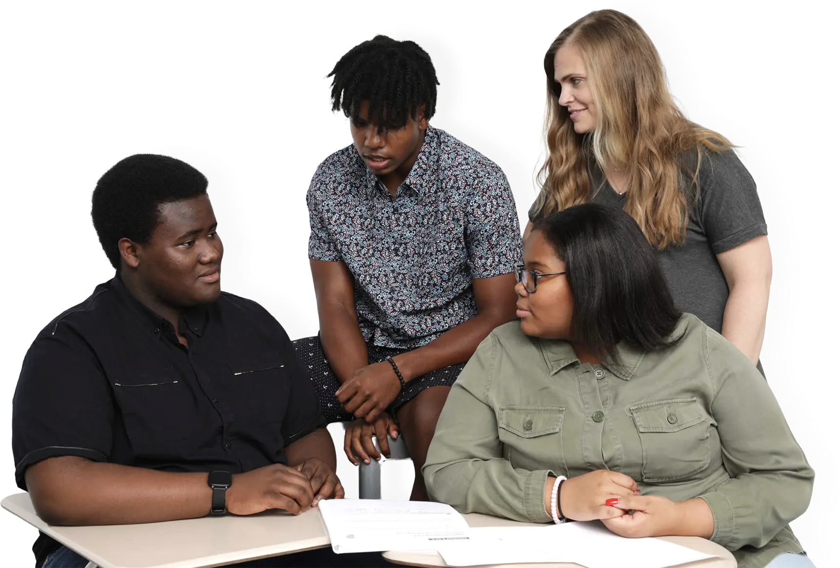 One female teacher and three students talking