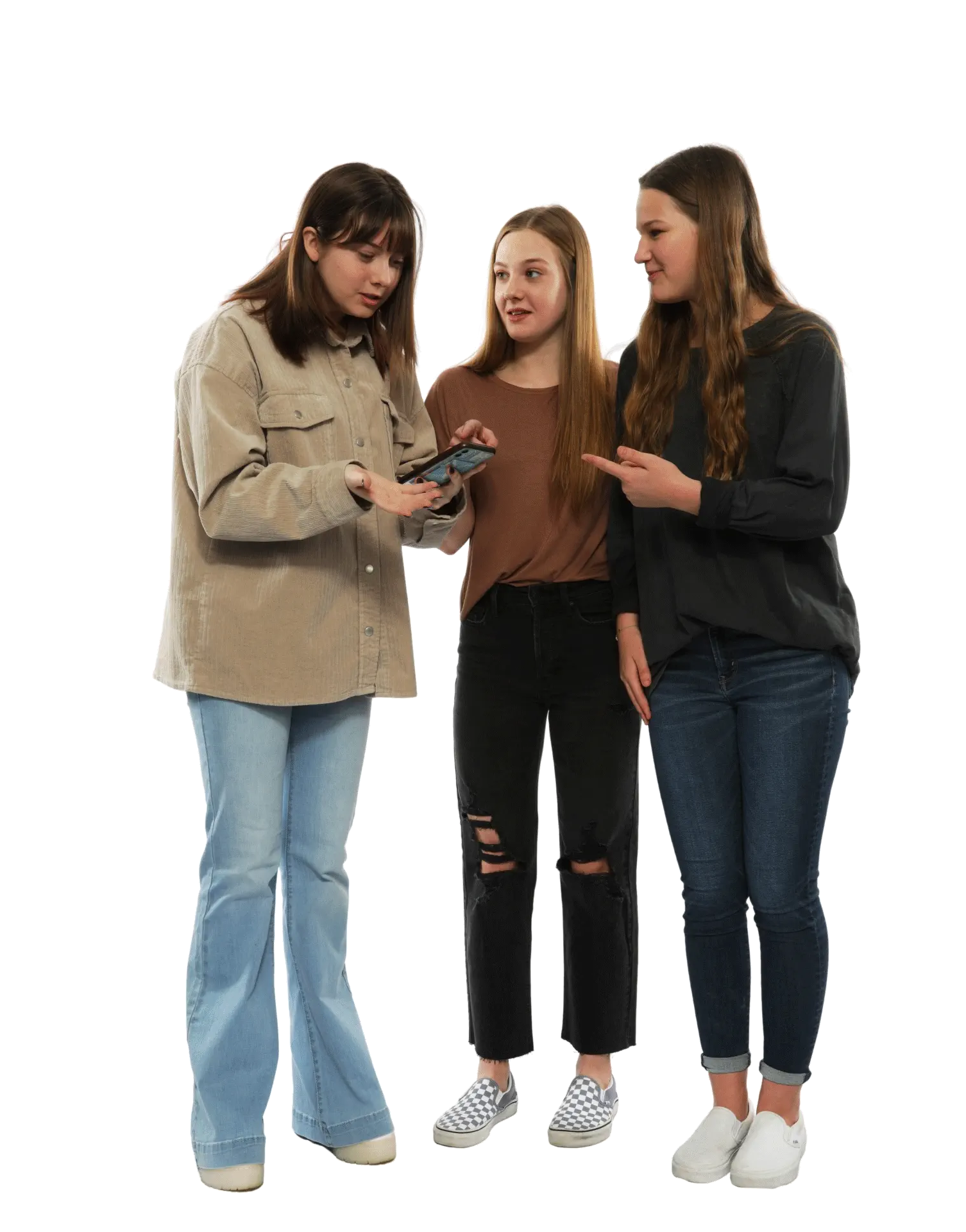 Three teen girls smiling at a cellphone