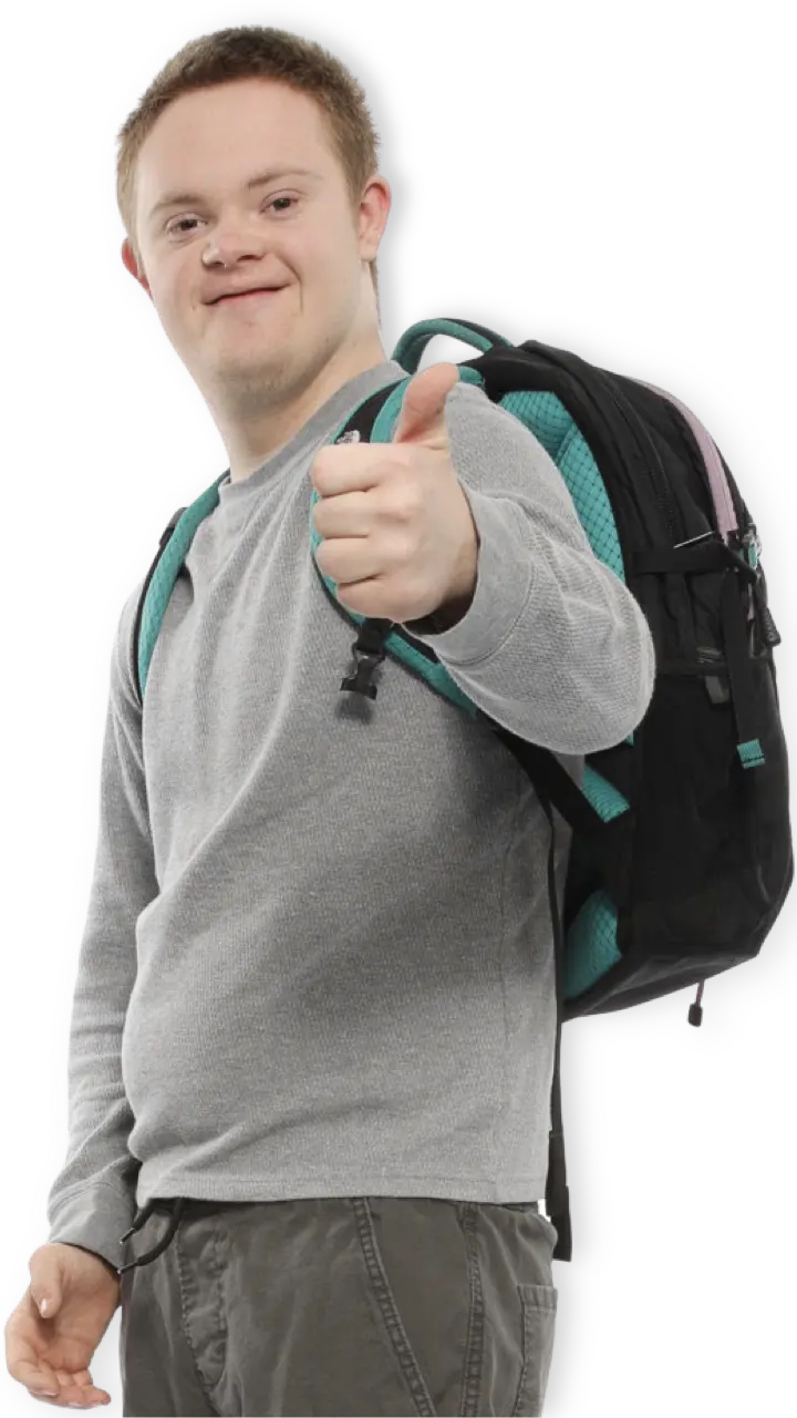 Male student wearing a backpack and holding a thumbs up