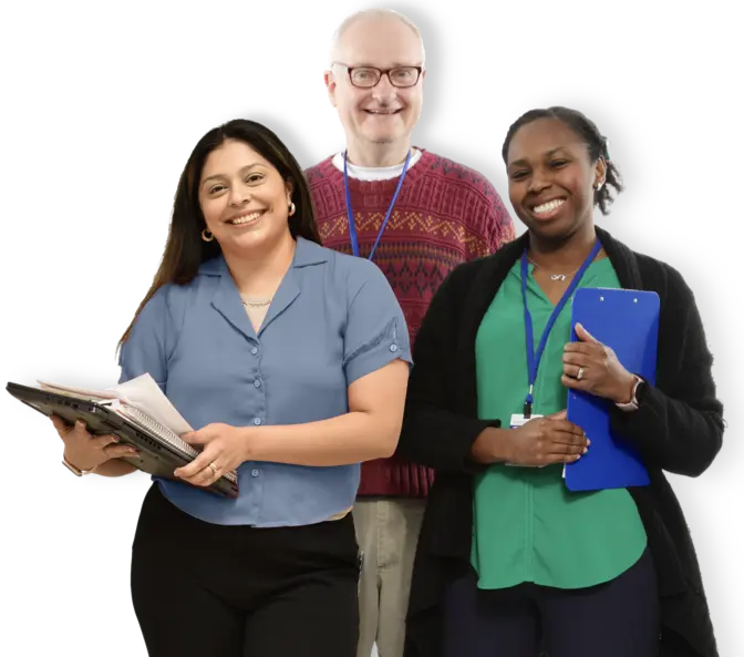 One male and two female teachers smiling and holding clipboards